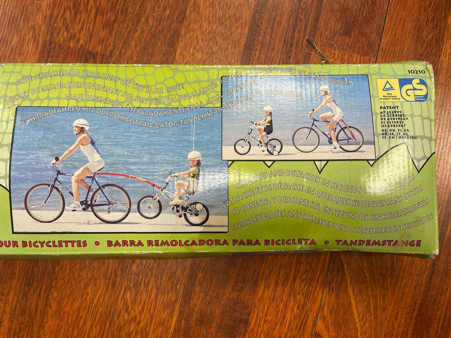 Barre de remorquage tandem pour velo enfant TRAIL-GATOR - OURS VÉLOS